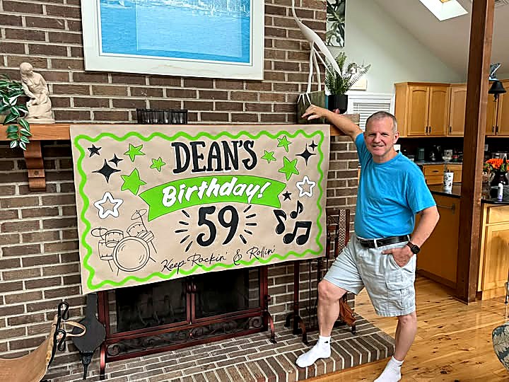 Personalized hand-painted 59th birthday banner displayed in a Southern Maryland home